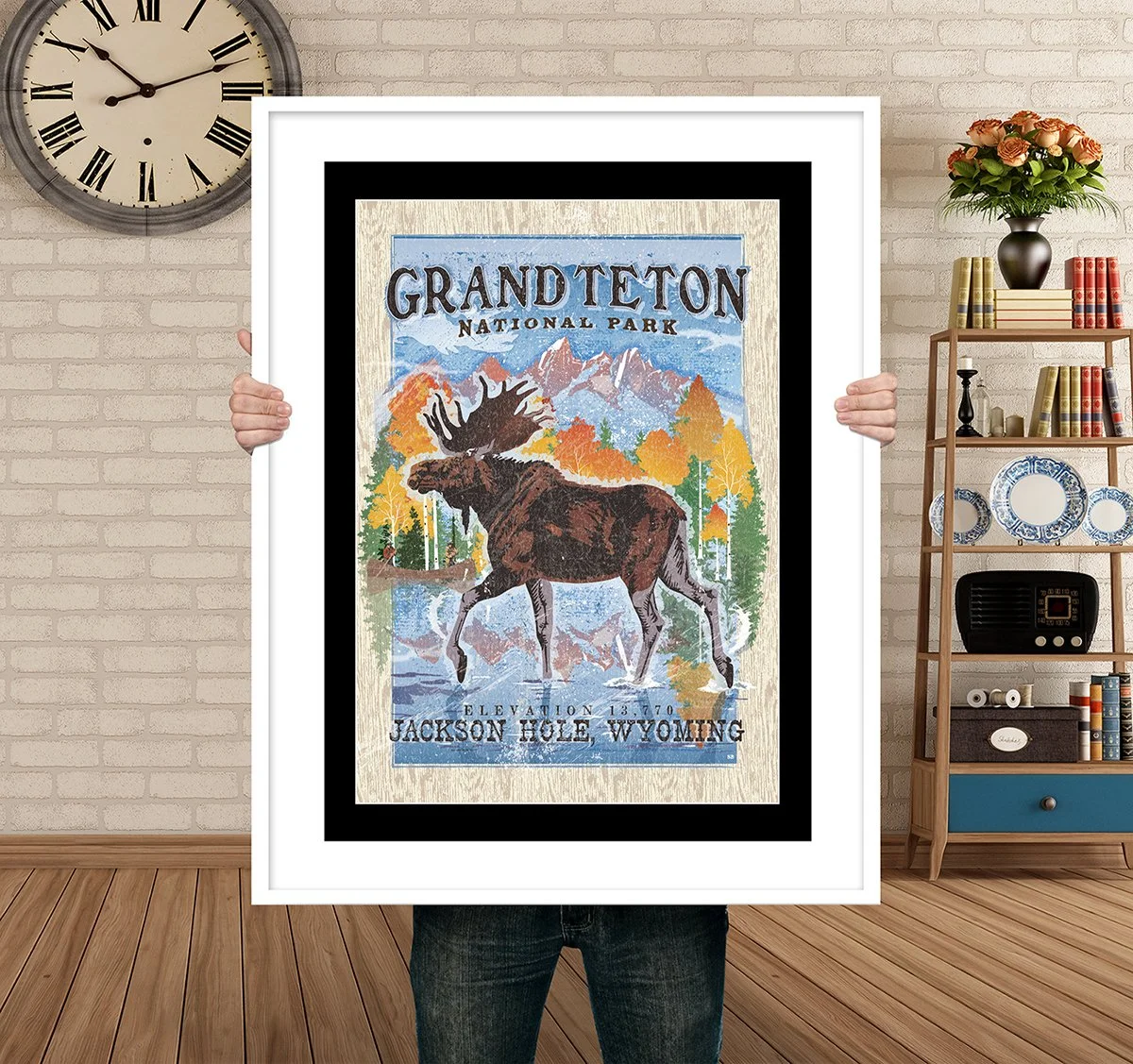 Man Holding Poster Mockup jackson moose fall.jpg