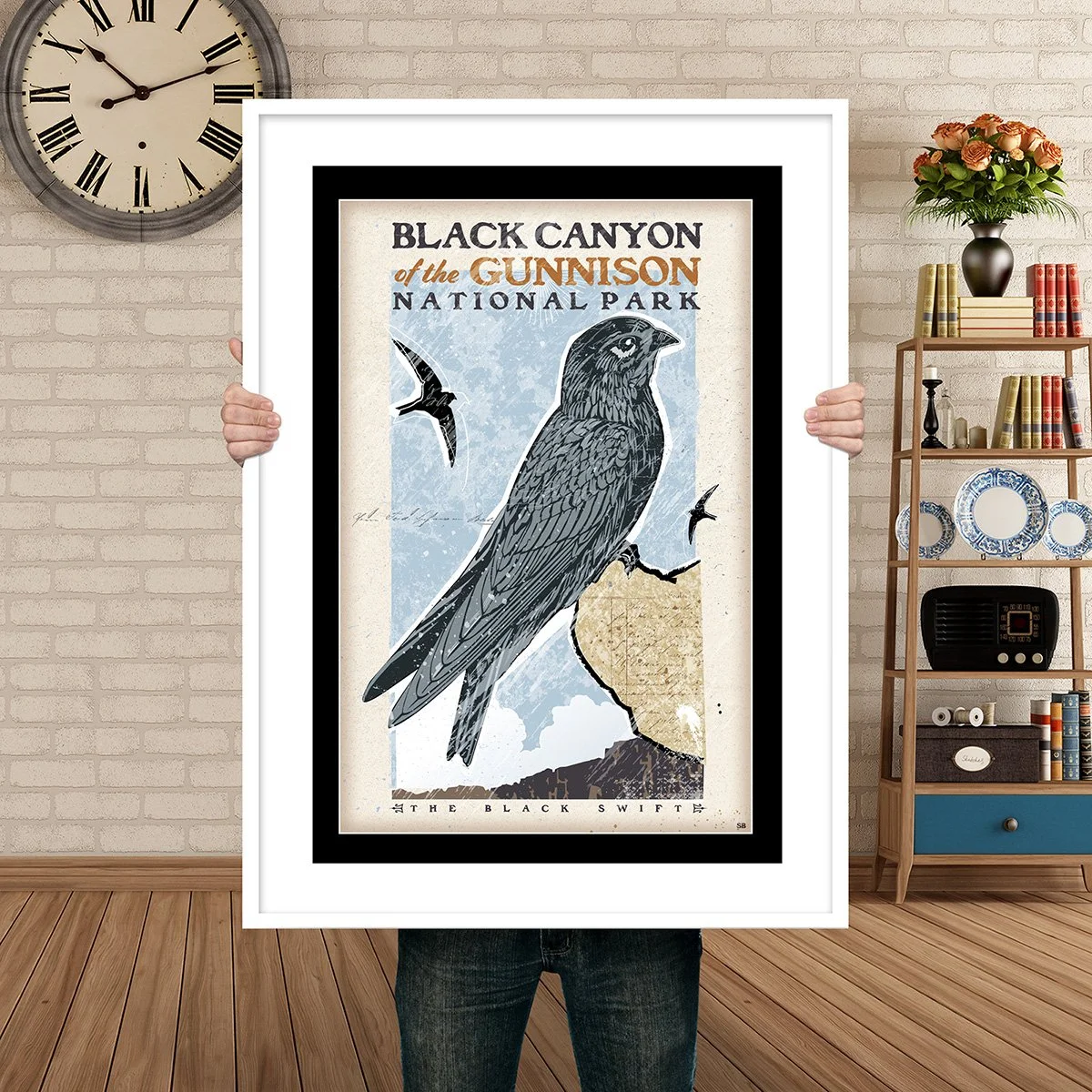 Man Holding Poster Mockup Black swift.jpg