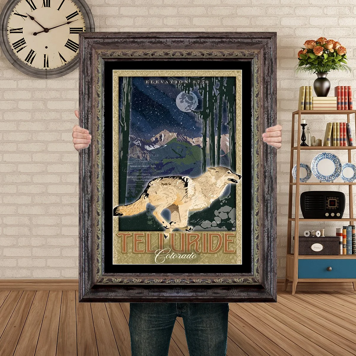 Man Holding Poster Mockup Barnwood TElluride Wolf.jpg