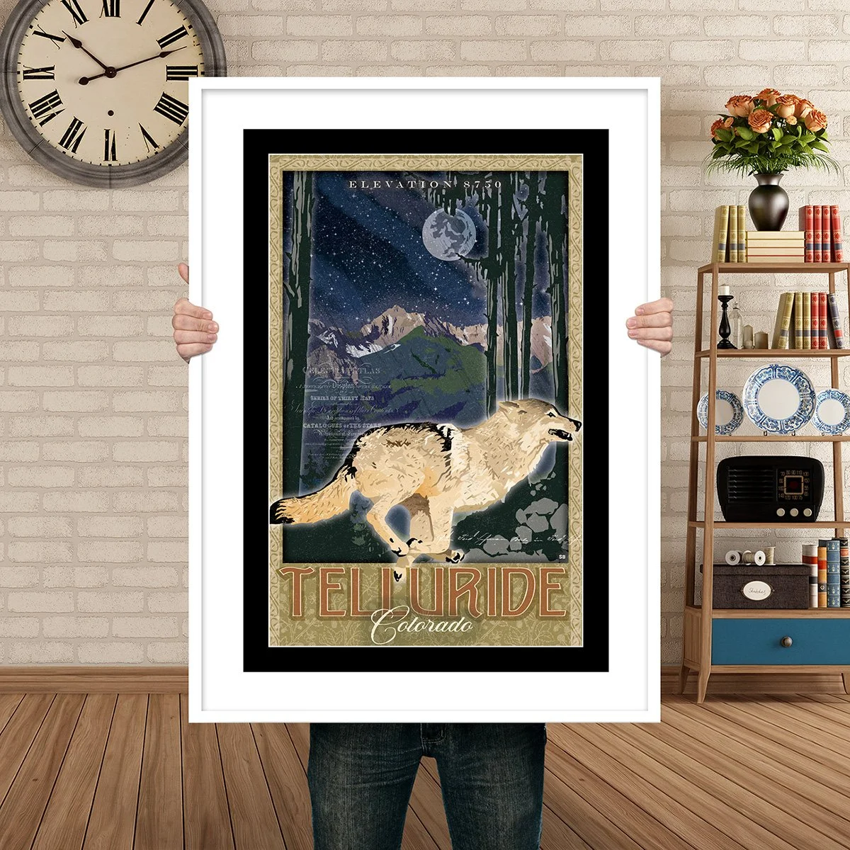 Man Holding Poster Mockup Telluride Wolf.jpg