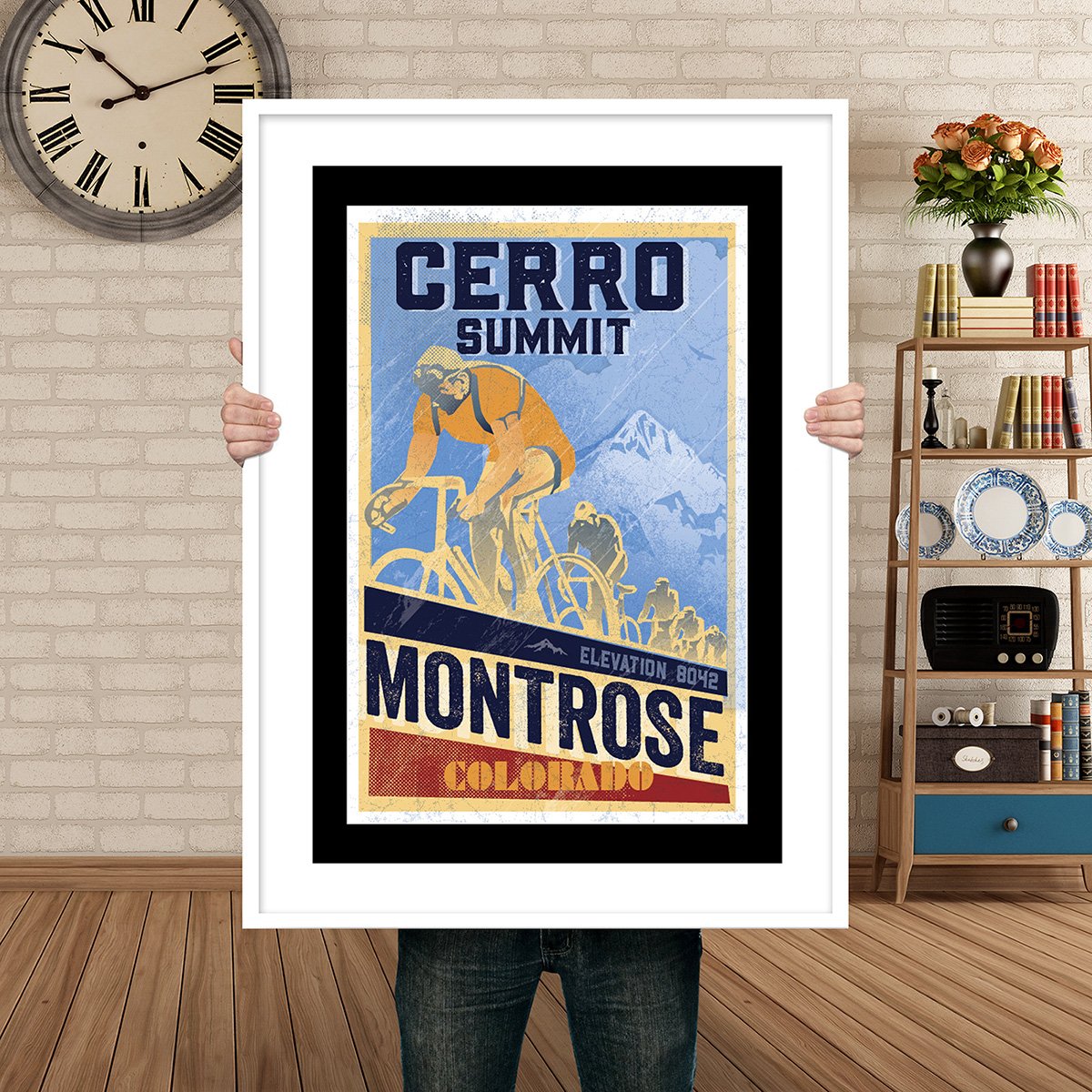 Man Holding Poster Mockup Cerro summit.jpg