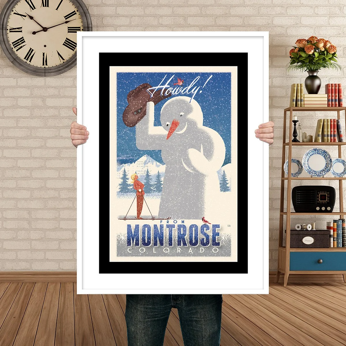 Man Holding Poster Mockup Cowboy Snowman Montrose.jpg