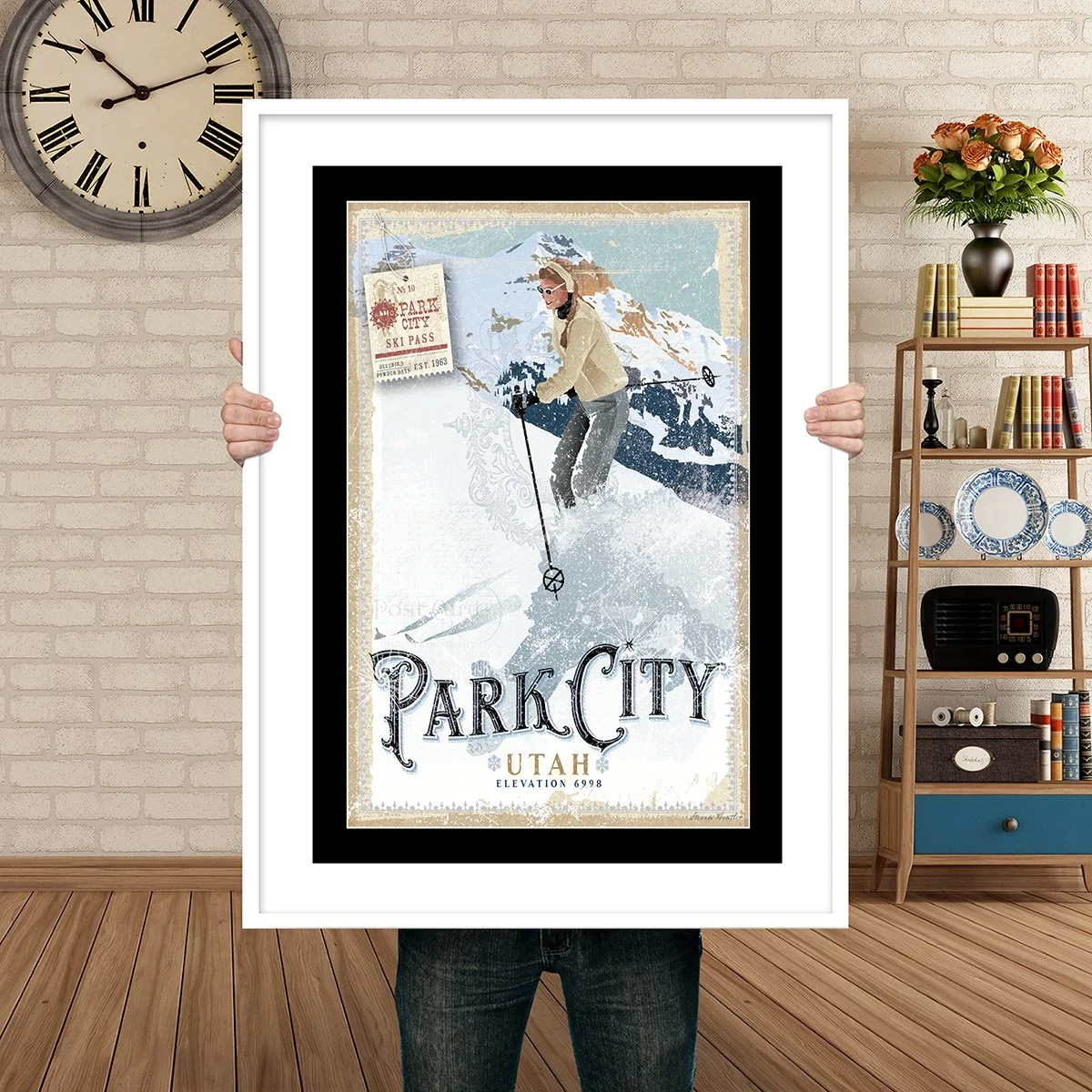 Man Holding Poster Mockup Park City Powder girl.jpg