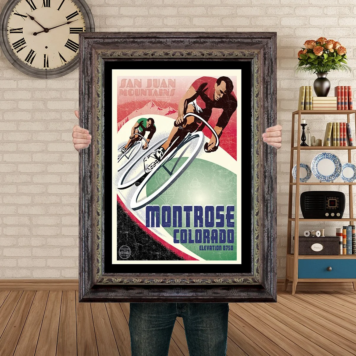 Man Holding Poster Mockup Barnwood Montrose Track Bike.jpg