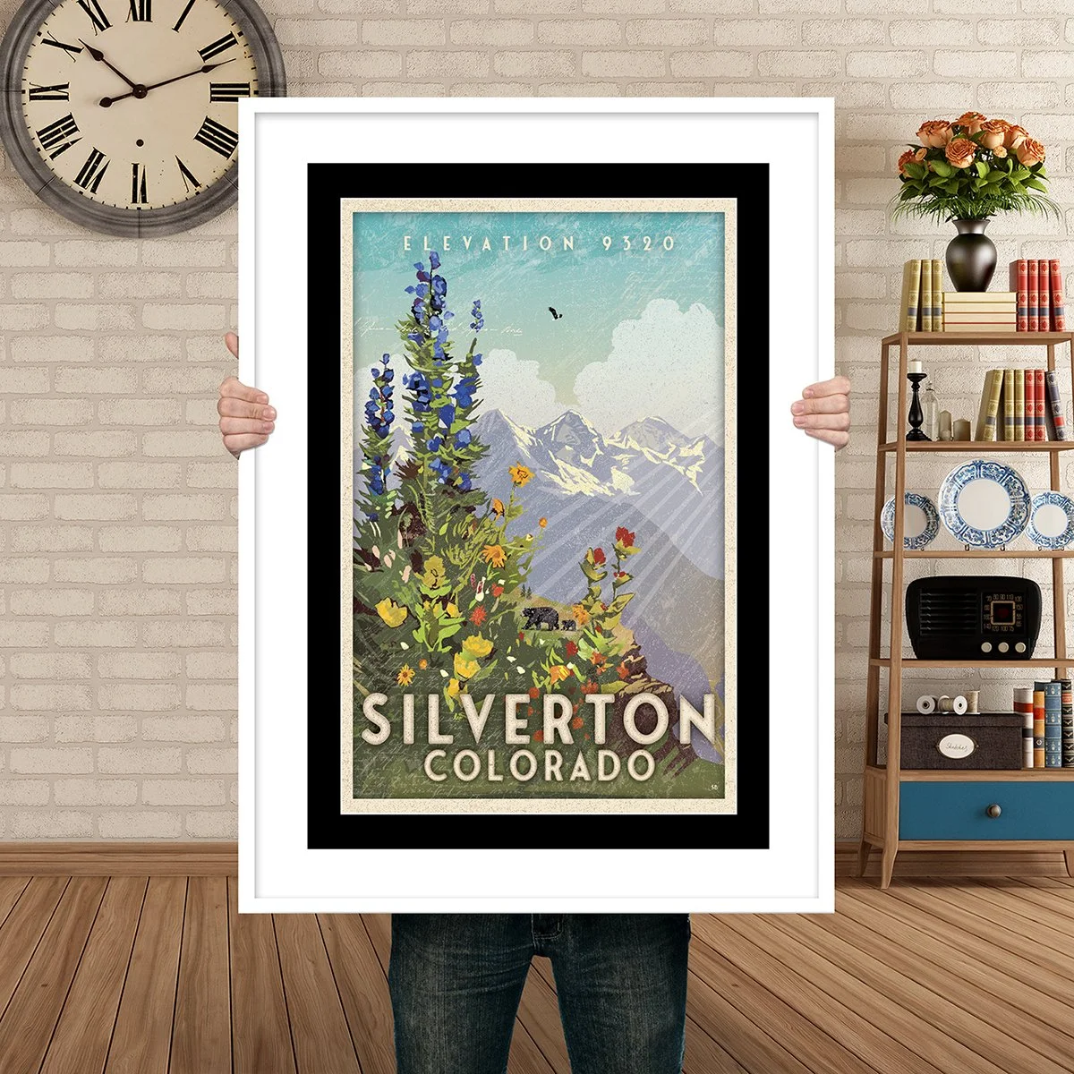 Man Holding Poster Mockup Silverton High country Wildfowers.jpg