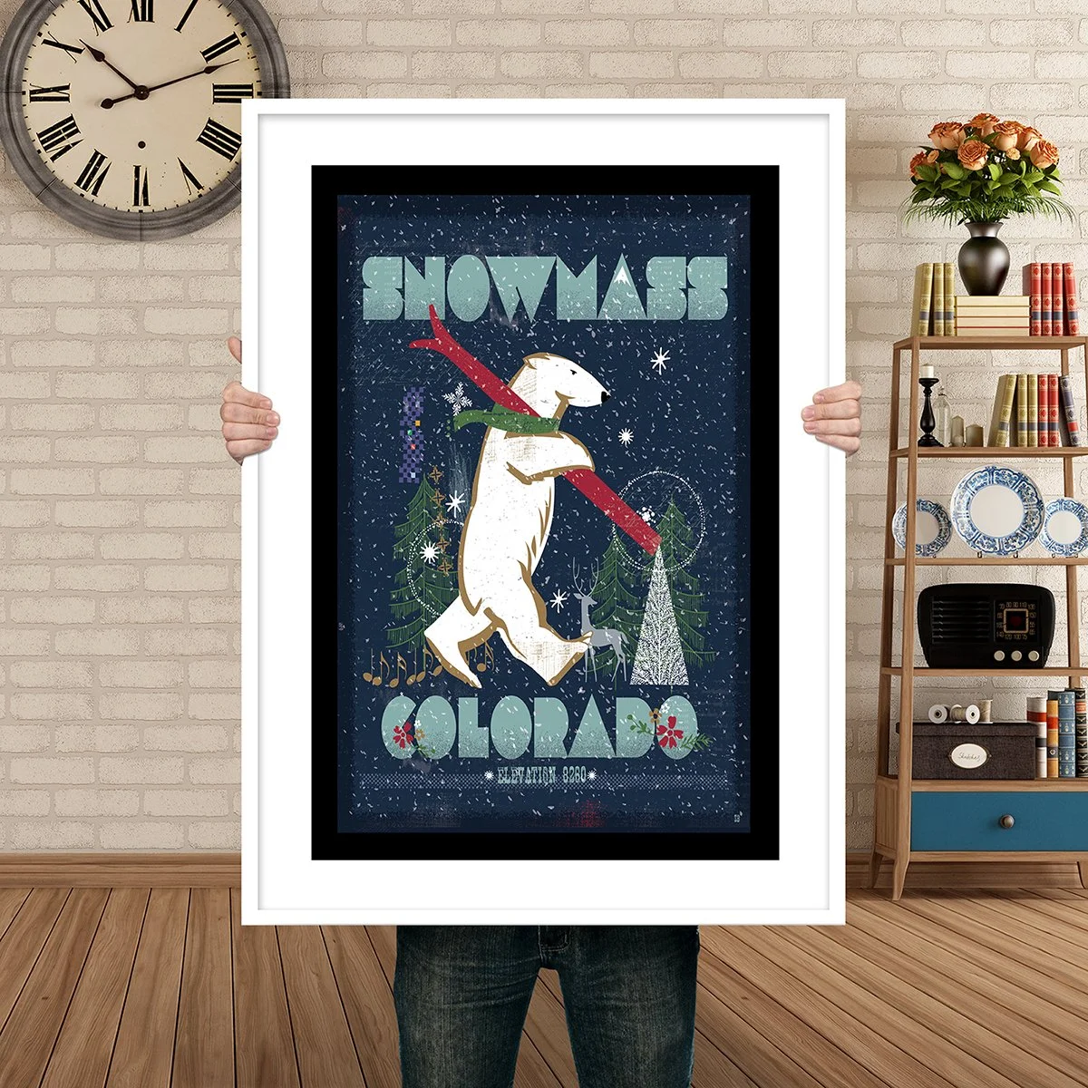 Man Holding Poster Mockup Snowmass Polar Bear.jpg