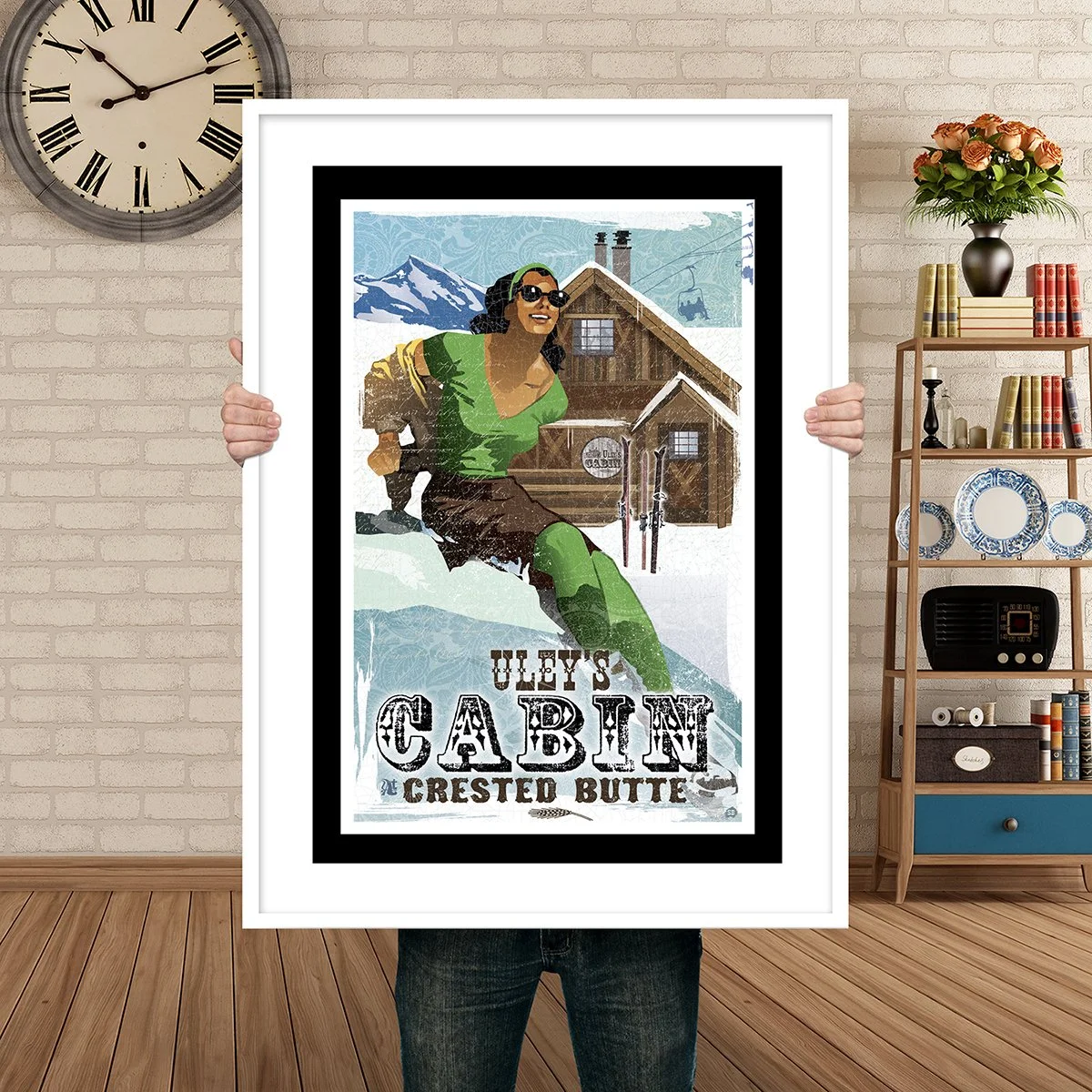 Man Holding Poster Mockup Uleys cabin.jpg