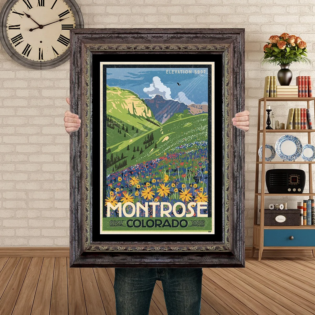 Man Holding Poster Mockup Barnwood Monrose Wildflowers.jpg