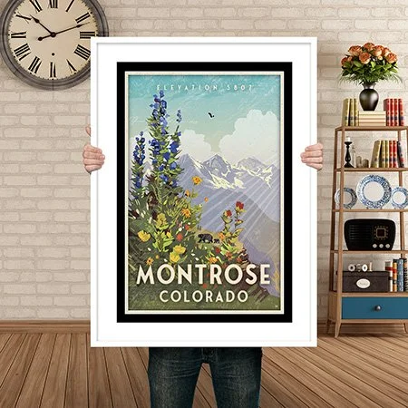 Man Holding Poster Mockup MONTROSE BEAR WILDFLOWERS.jpg