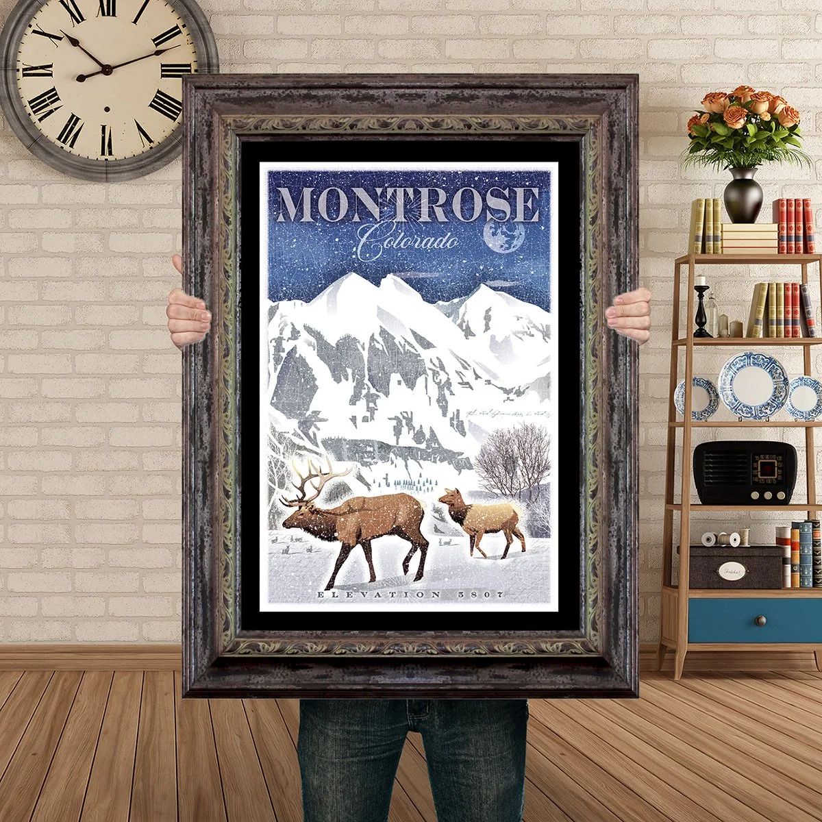 Man Holding Poster Mockup Barnwood Winter Elk Montrose.jpg