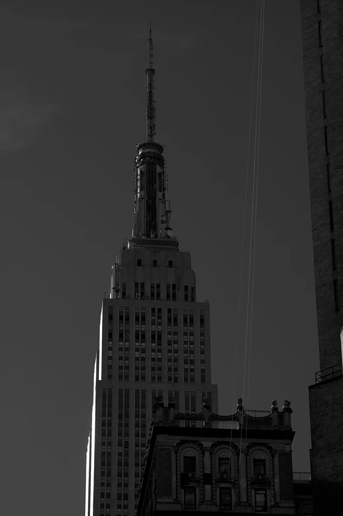 NYC, 2012 After running across town from the Marc Jacobs show I stopped to take this shot of the sun setting on the side of the Empire State Building. I remember being super stressed because I couldn't find a cab after the show which meant I had to literally run to Lincoln Centre. This kind of made up for it.