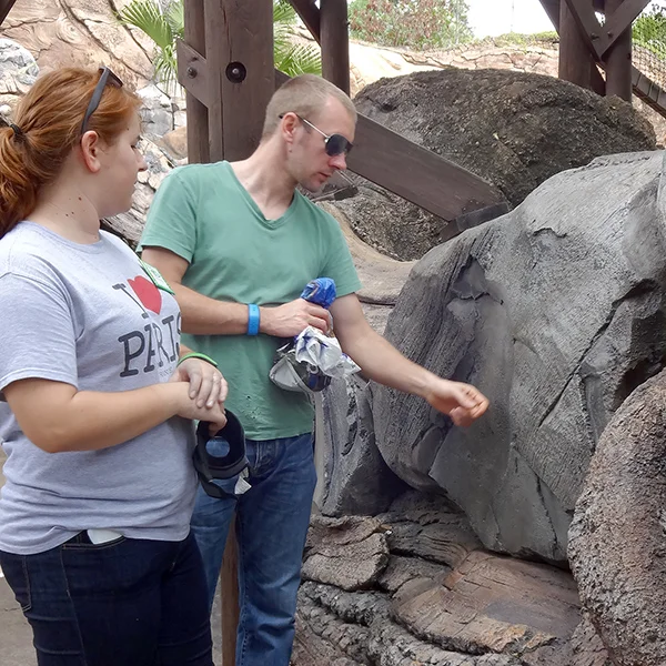 hailey and peter looking at rock.jpg