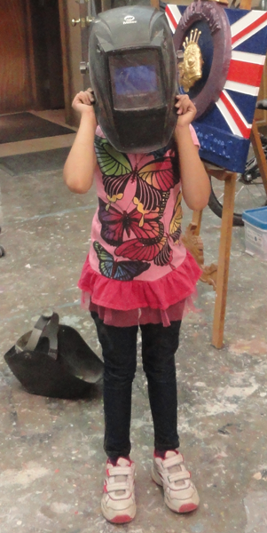 phoebe with welding hat.png