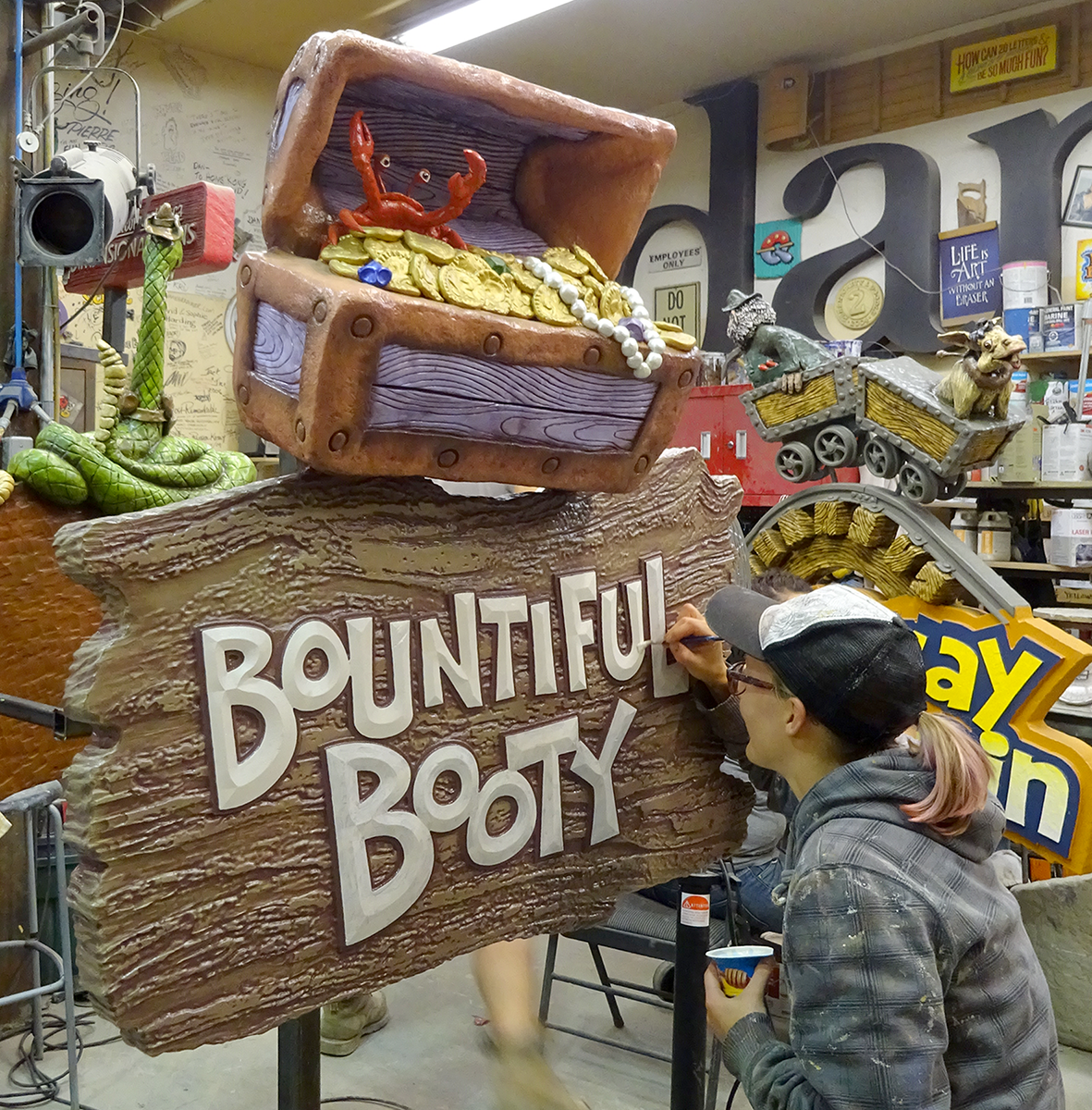 Angie painting booty sign.png