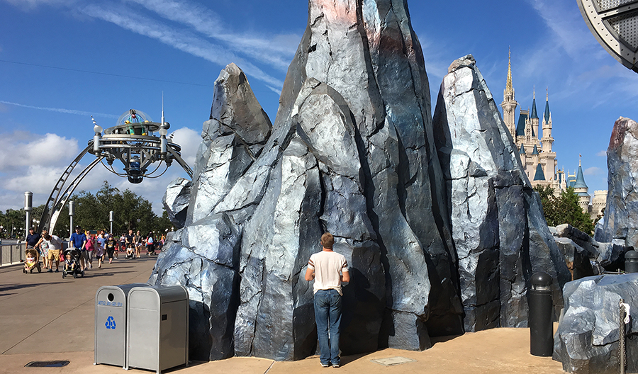 peter looking at rockwork.png
