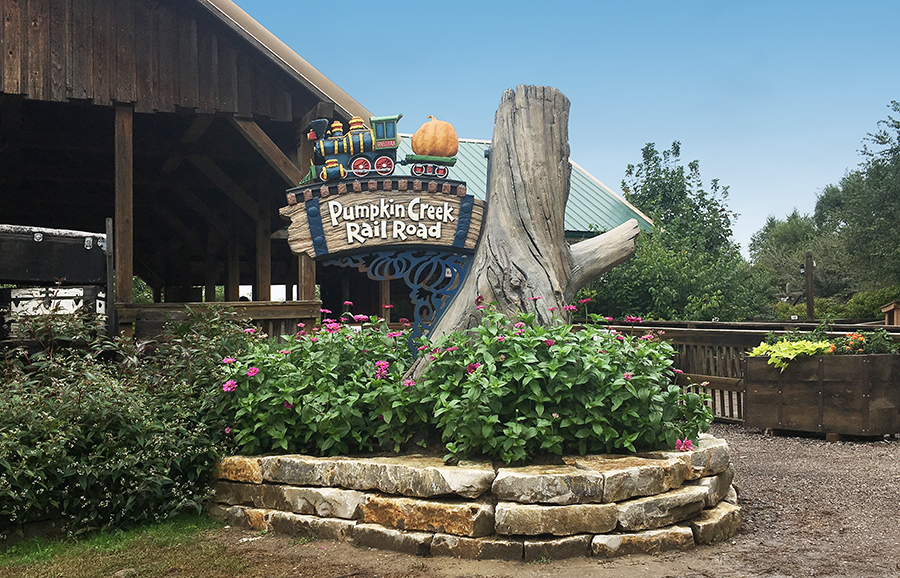 pumpkin creek sign open.png