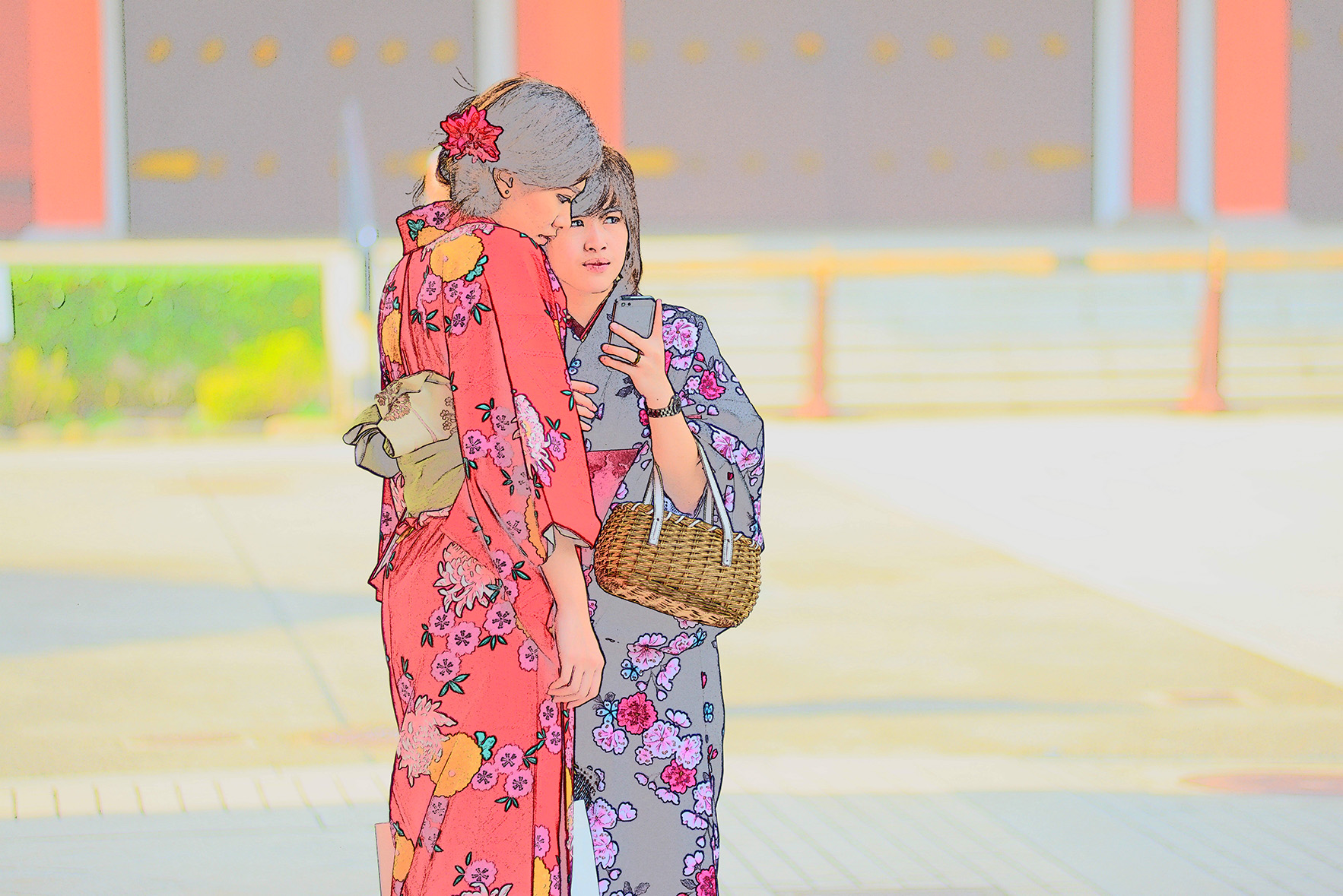 Tokyo is a city full of fascinating juxtapositions. Here, two women are adorned in traditional kimonos while using a smartphone. 