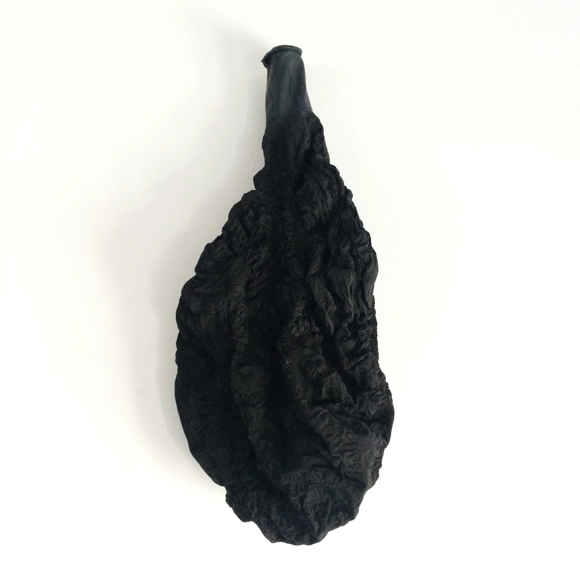 Big Black Sigh , 2016, gesso, latex.