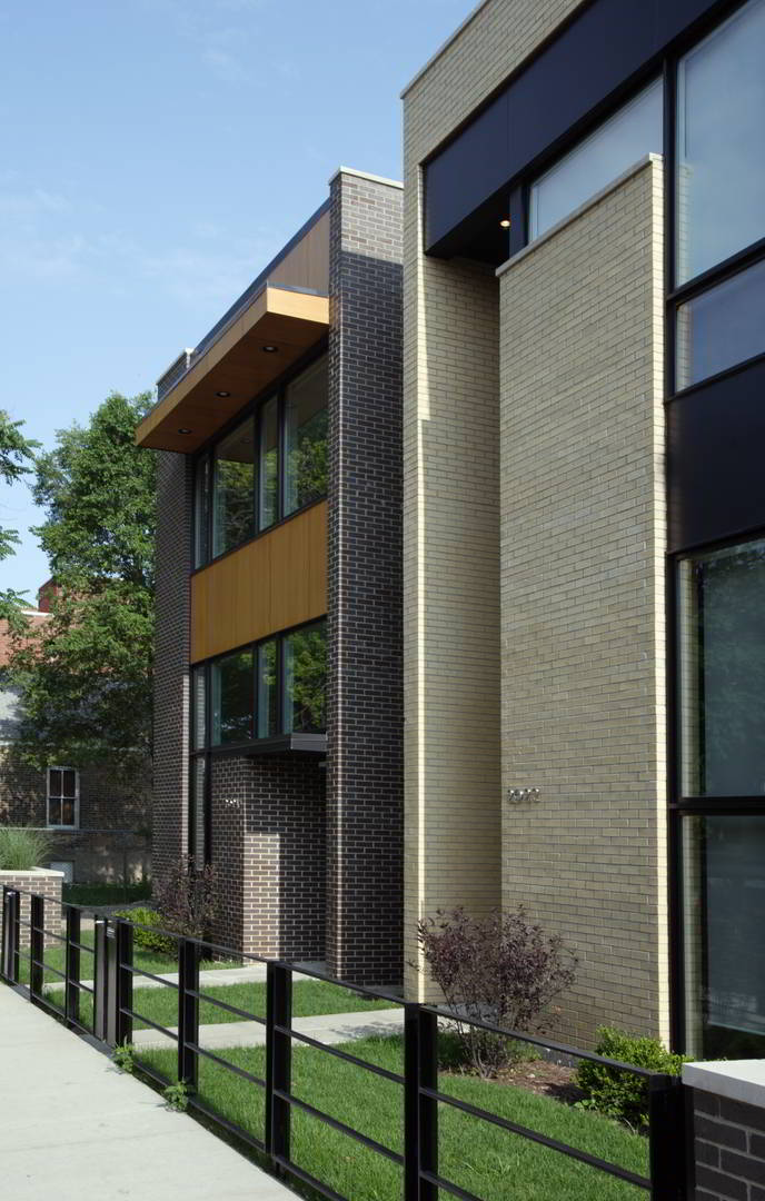Single-Family Location: Chicago, IL Photos: Marty Peters 2006 Builder's Choice Awards Conveying a strong sense of community on this quiet residential street, these six single family homes redefine elegance and comfort. The homes remain discreet in scale, and respond to the culturally rich neighborhood, utilizing “soft” distinctive materials, such as brick and copper. Each will be strikingly individual, yet balance each other in this remarkable community of homes. Each home has an inviting lushly landscaped front yard, complementing existing residential homes on the street. The interiors of the homes will filter warm southern light through the layered spaces, accentuating the open, flexible planning. The careful use of glass and dramatic spatial volumes create a breathtaking connection between the homes, the neighborhood and the city. Intriguing back yard arrangements will encourage a communal coherence between neighbors, while respecting privacy and security. With simple yet aesthetically strong compositions, these homes, created by Studio Dwell Architects will entice the senses and captivate the individual.
