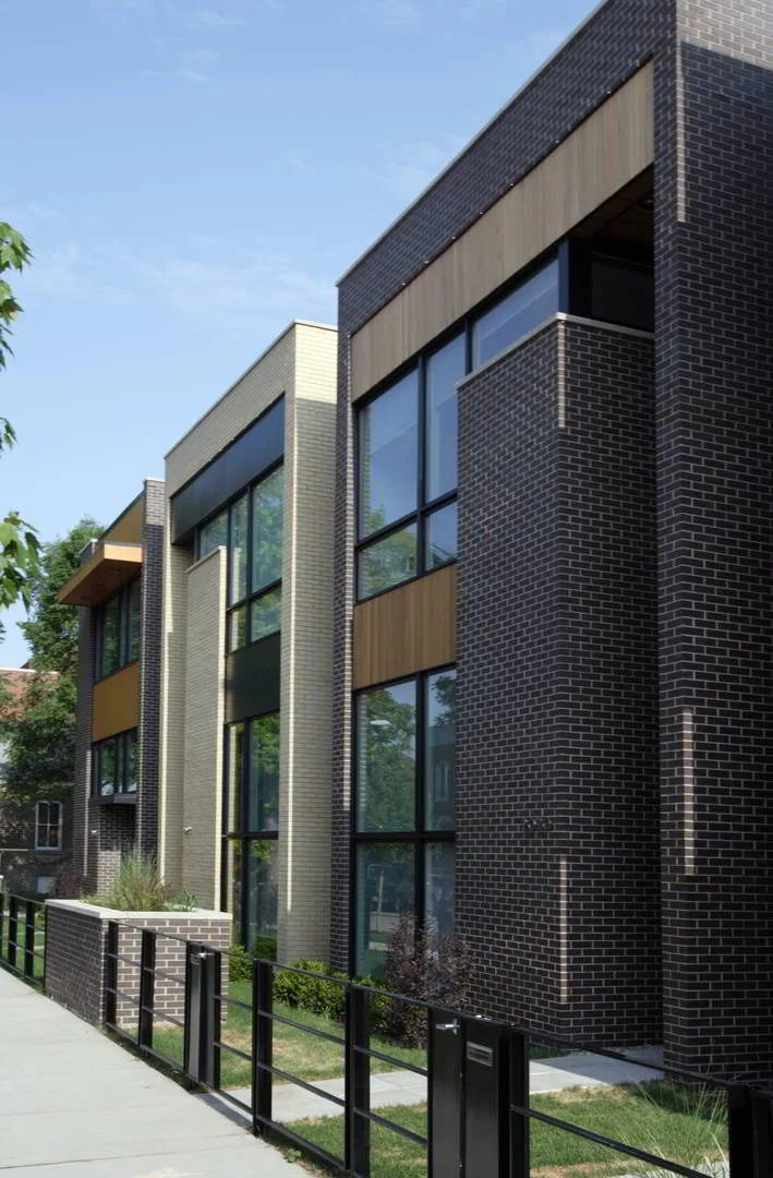 Single-Family Location: Chicago, IL Photos: Marty Peters 2006 Builder's Choice Awards Conveying a strong sense of community on this quiet residential street, these six single family homes redefine elegance and comfort. The homes remain discreet in scale, and respond to the culturally rich neighborhood, utilizing “soft” distinctive materials, such as brick and copper. Each will be strikingly individual, yet balance each other in this remarkable community of homes. Each home has an inviting lushly landscaped front yard, complementing existing residential homes on the street. The interiors of the homes will filter warm southern light through the layered spaces, accentuating the open, flexible planning. The careful use of glass and dramatic spatial volumes create a breathtaking connection between the homes, the neighborhood and the city. Intriguing back yard arrangements will encourage a communal coherence between neighbors, while respecting privacy and security. With simple yet aesthetically strong compositions, these homes, created by Studio Dwell Architects will entice the senses and captivate the individual.