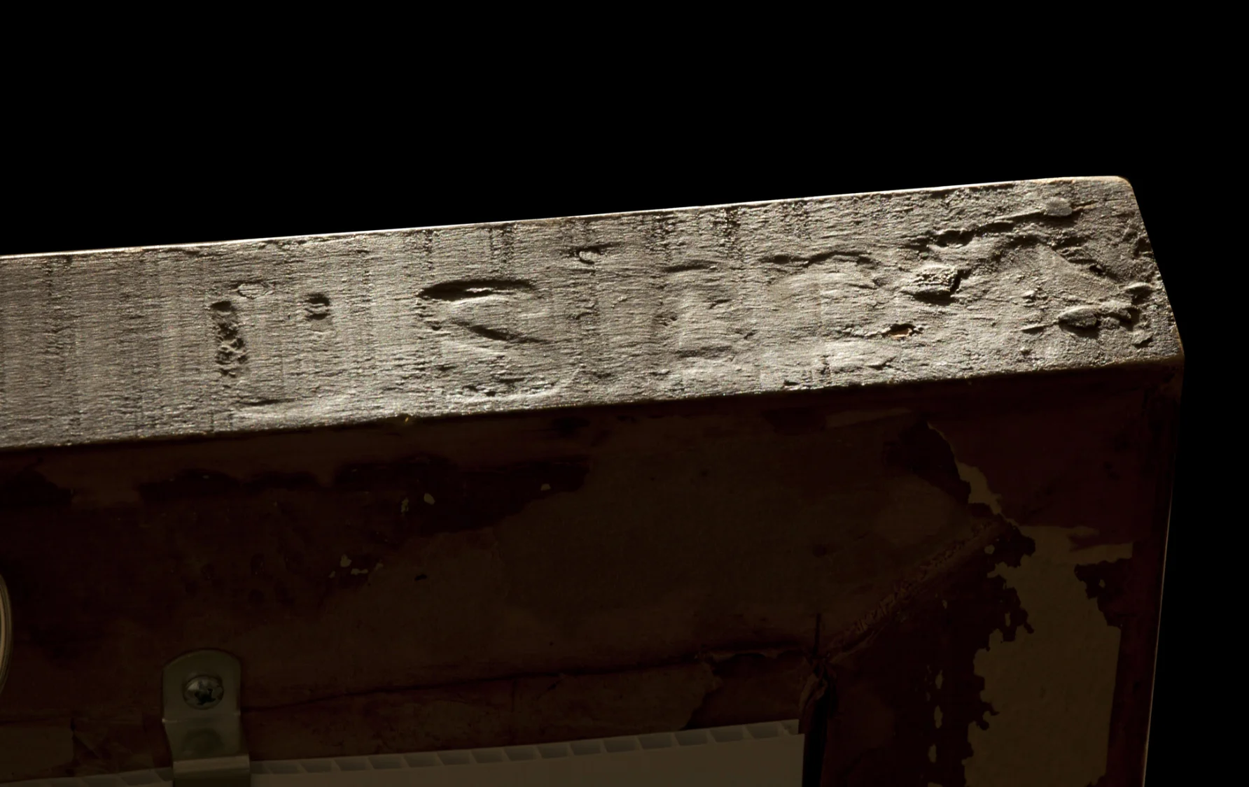 Above: Hand-carved inscription which reads: U.S.ARMY. The painting that this frame was acquired with is in the style of the Russian artist, Olga Rozanova.