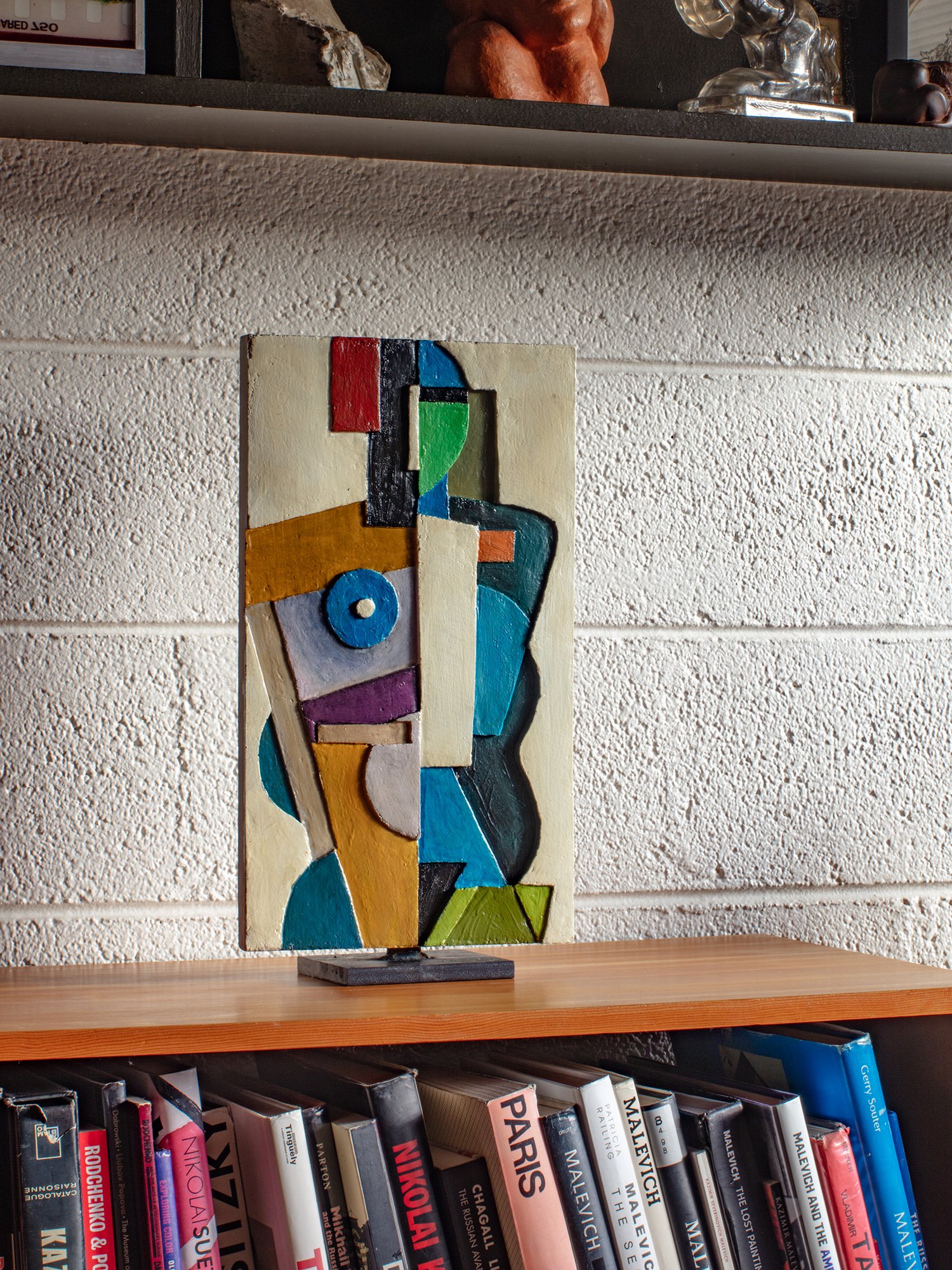   ‘THE DOCTOR”   Painted Concrete on an Iron Base.  19.5 x 11.5 inches 