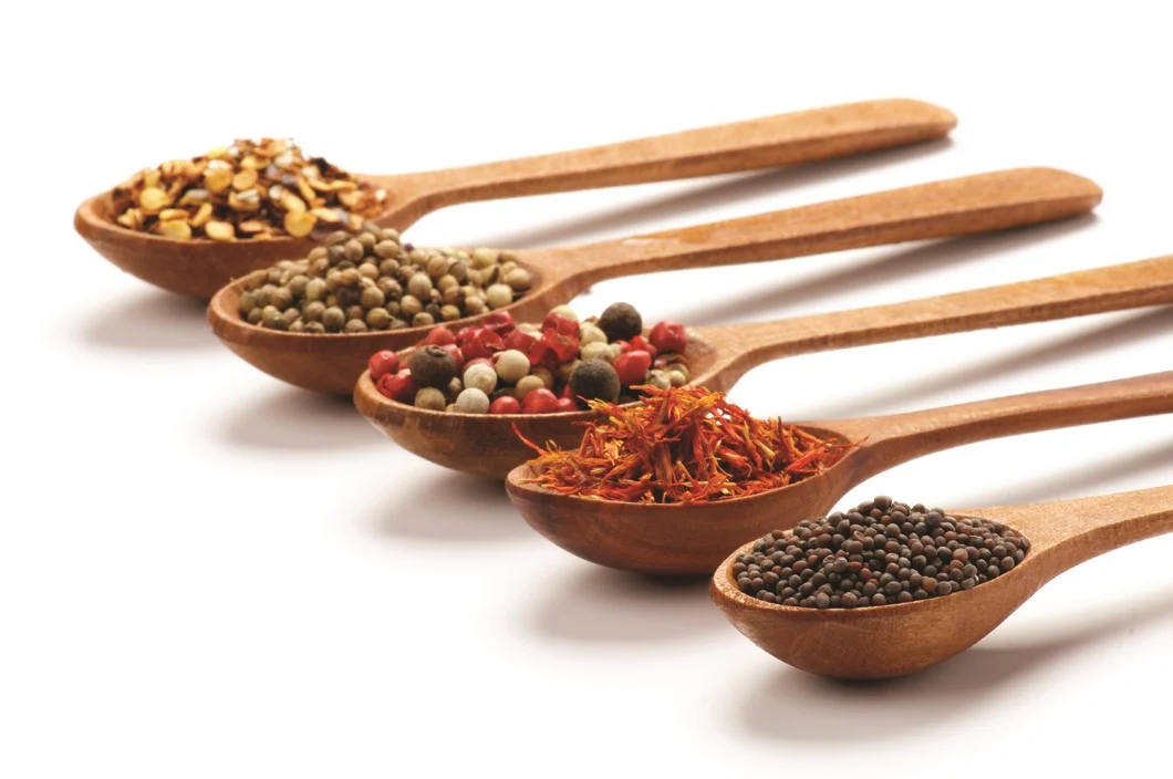 wooden spoons full of spice.jpg