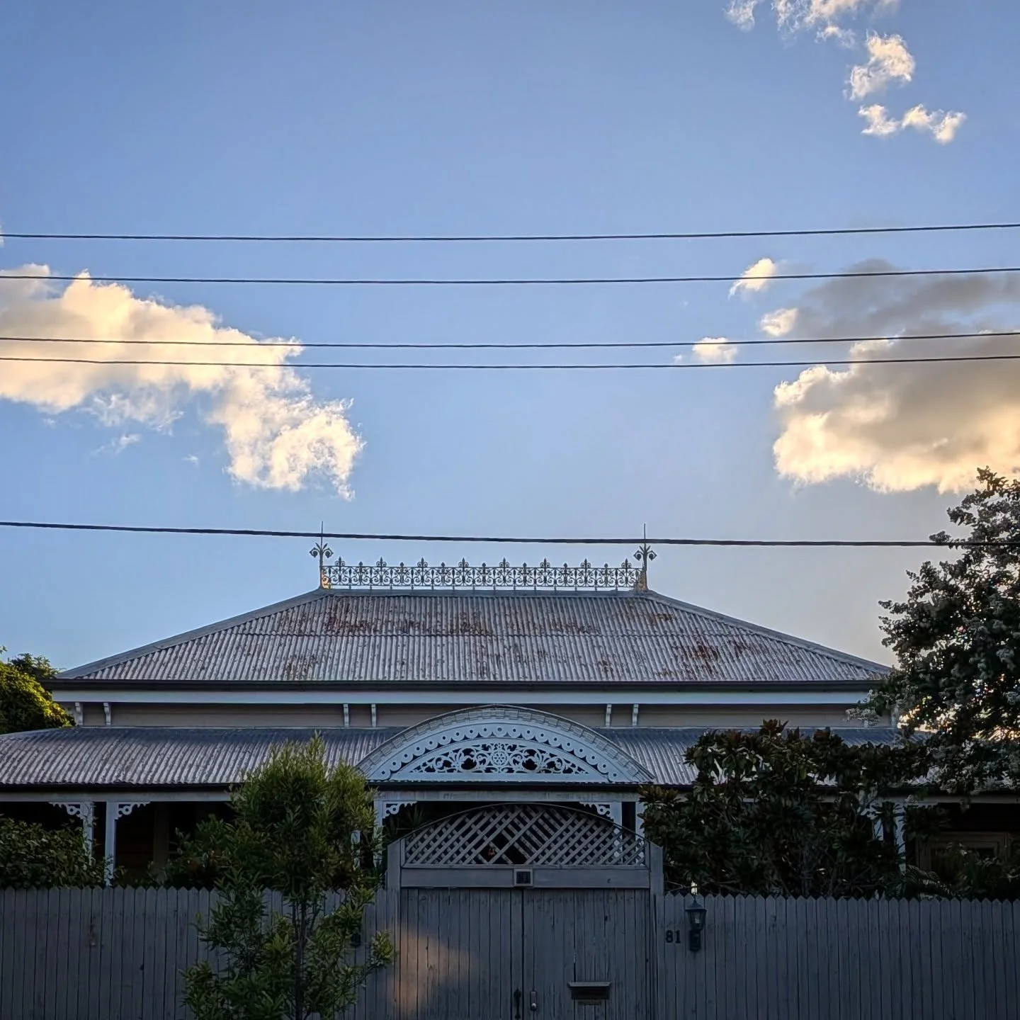 Closing off the Queenslander carousel with this lightly rusted lacy silhouette against beautiful Brizzy skies