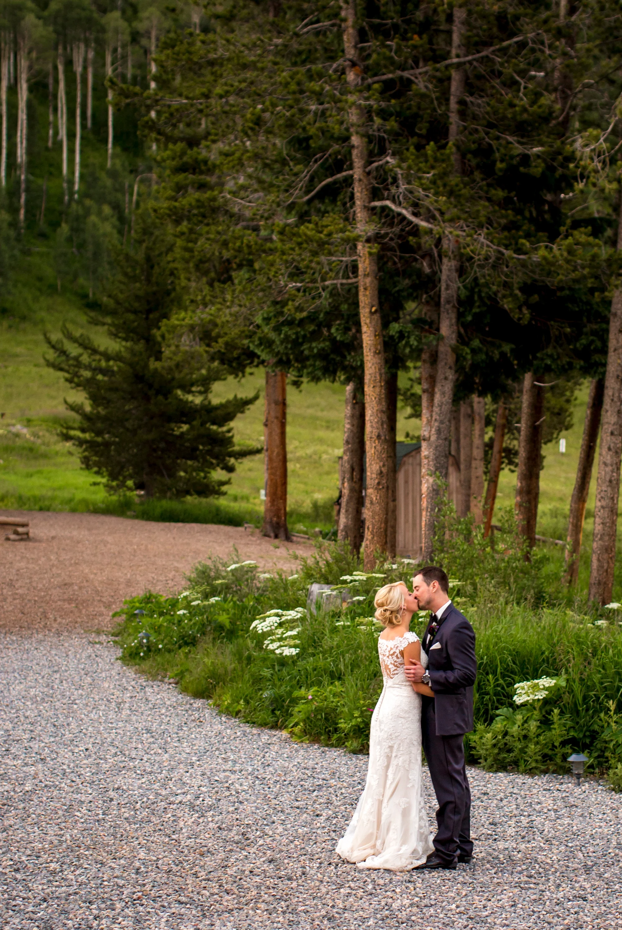 Dress & Tux from Dora Grace Bridal, Dress by Miss Stella York, Tux is Portofino 