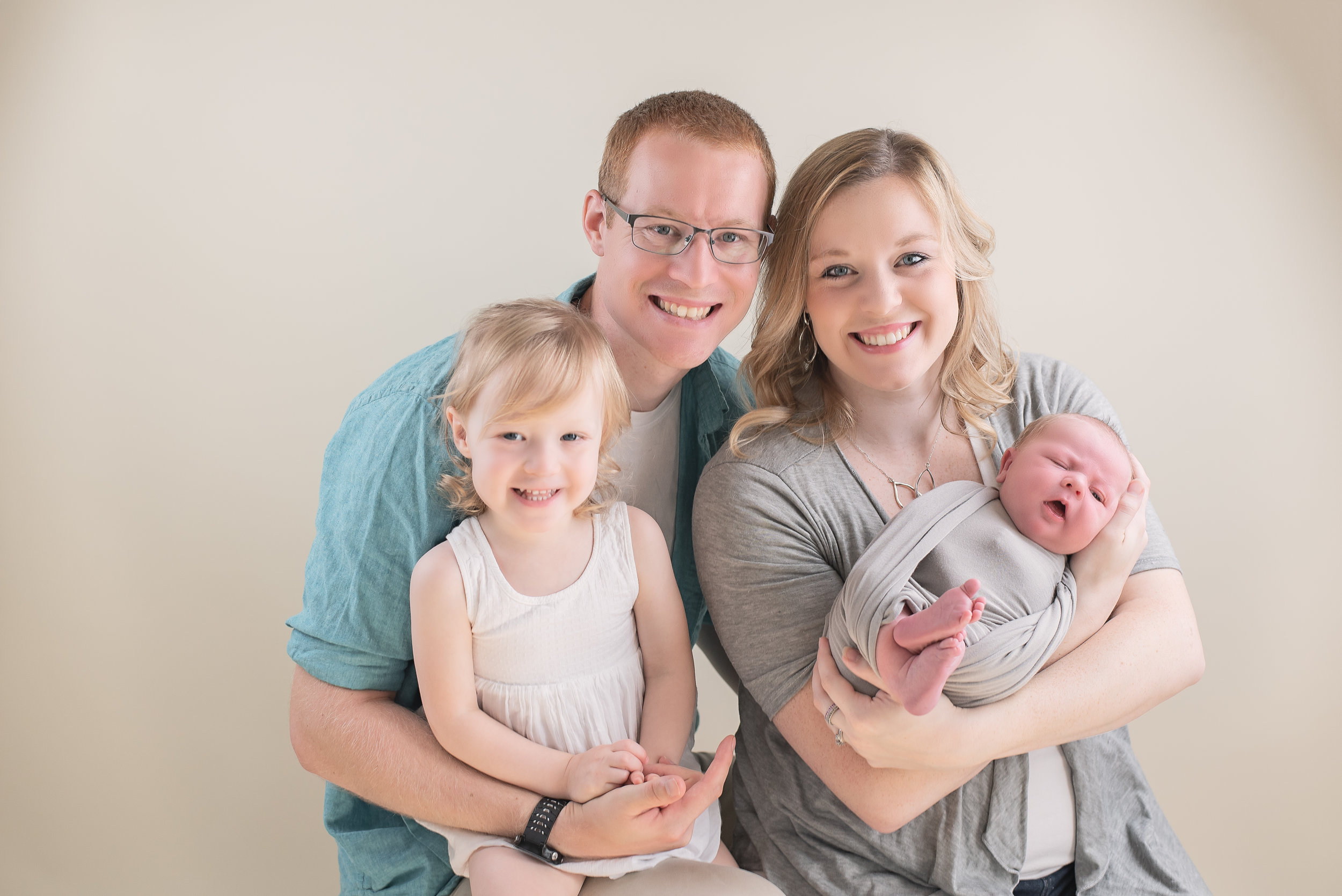 family of four newborn picture