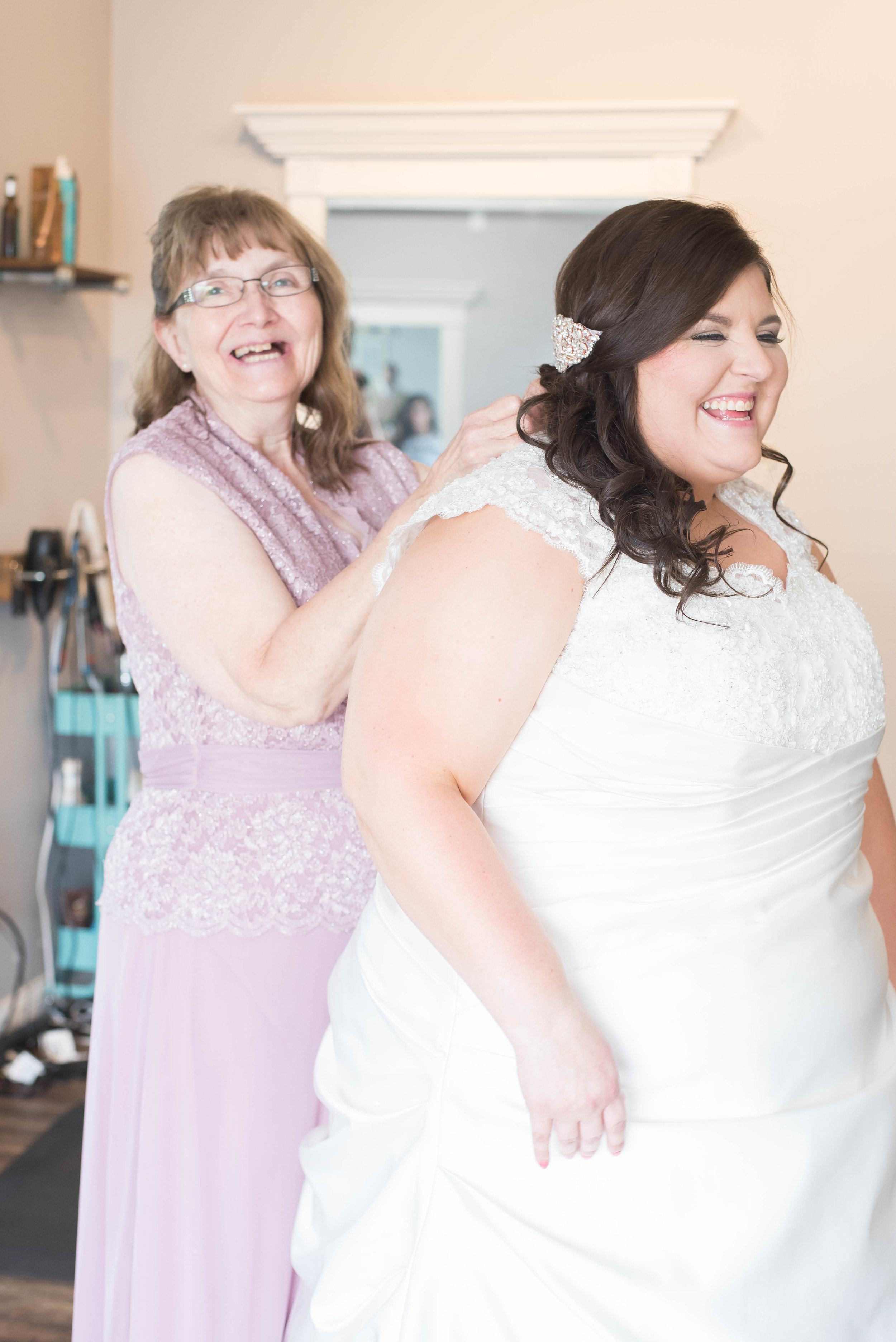 mom helping with dress