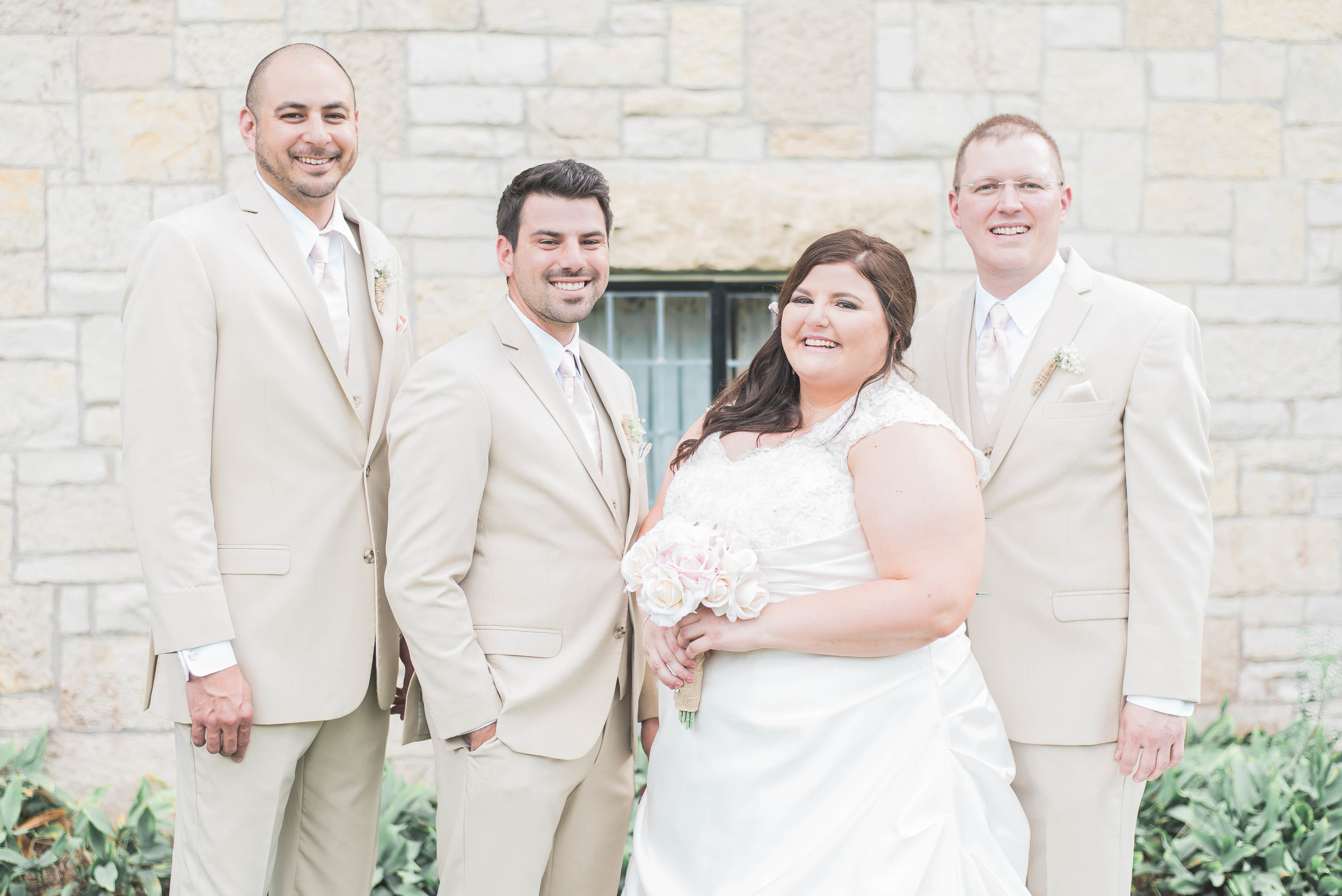 bride with groomsmen