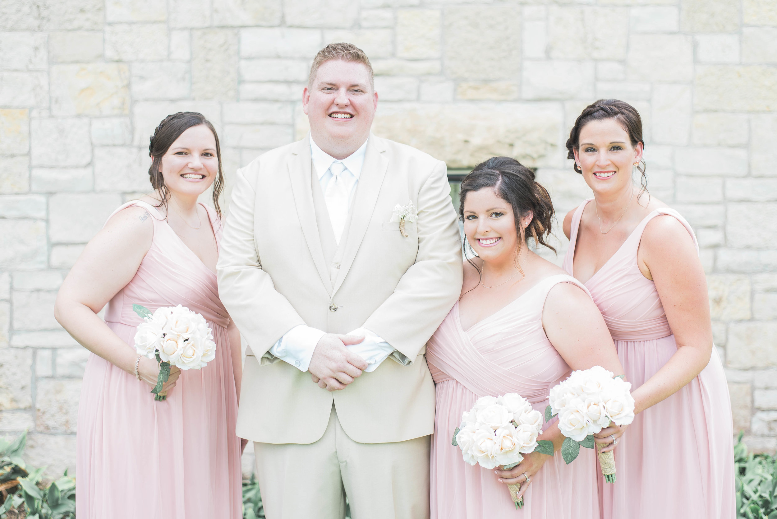 groom with bridesmaids