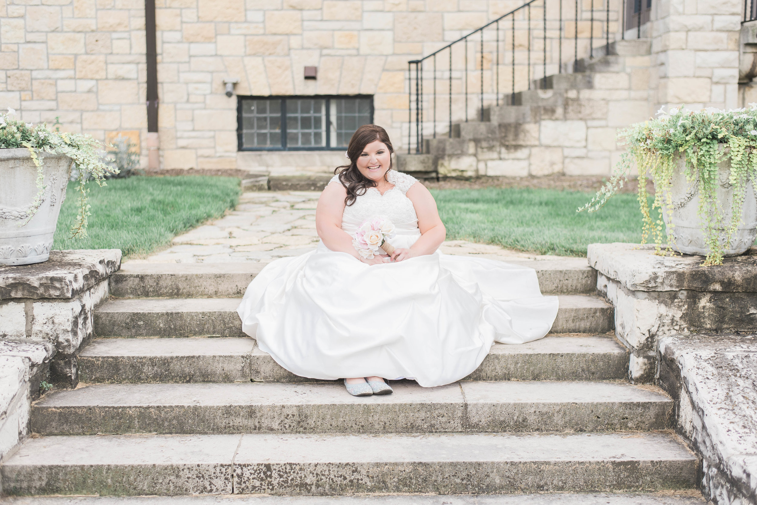 bride on stairs smiling