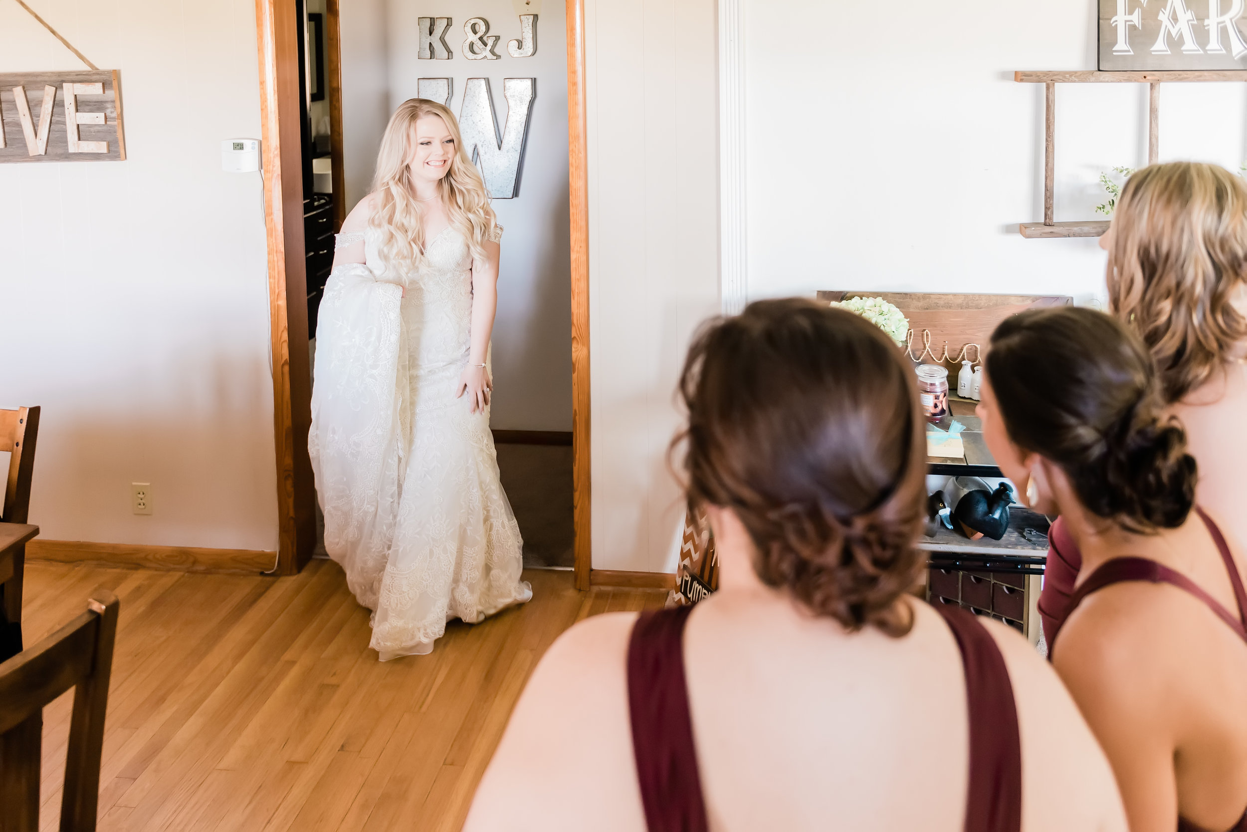 bride reveal to bridesmaids