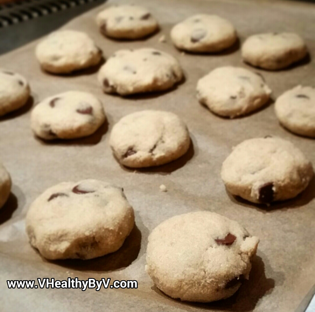 Step 6: Roll little balls of cookie dough in your hands (I make mine about 2" in diameter), then smash them in your hand or use a spatula to flatten them slightly once they are on the baking sheet, which is lined with parchment paper. They need to be flattened, since they do not rise or spread as they bake. 