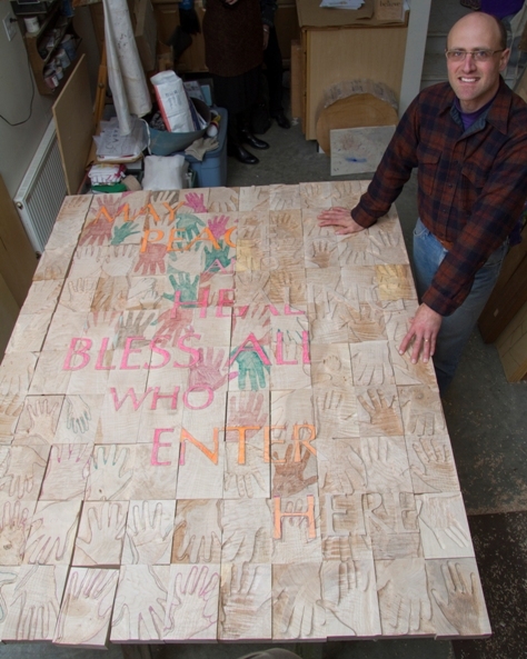 brian with incomplete piece in studio, from above compressed.jpg