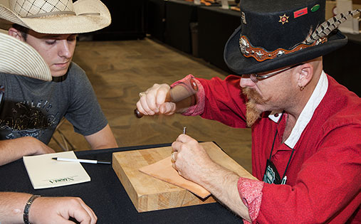 Teaching moment at the NBSSCA Mark of the Makers Contest at the Old West Show. 