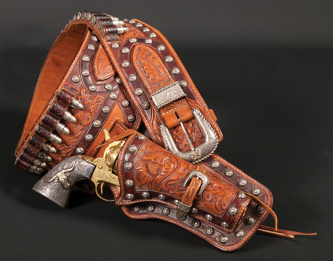 Lot 272: Cattle Brand Engraved Colt Single Action. Bohlin marked sterling and 14K gold grips with high relief steer head. Sold $18,150 Lot 273: Edward H. Bohlin Two-Tone, Sterling Gun Rig. Sold $7,865 Brian Lebel's Mesa Auction - January 21, 2017