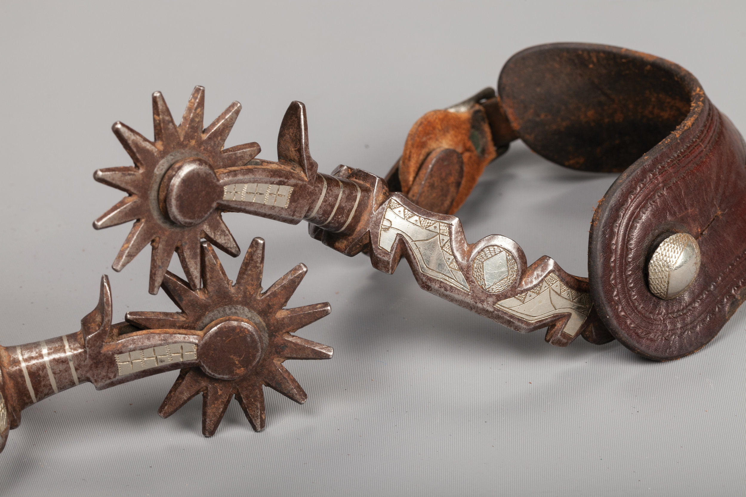 Lot 260: Canon City Double Mounted "Slipper" Spurs. Brian Lebel's Mesa Auction - January 21, 2017 Sold $10,925