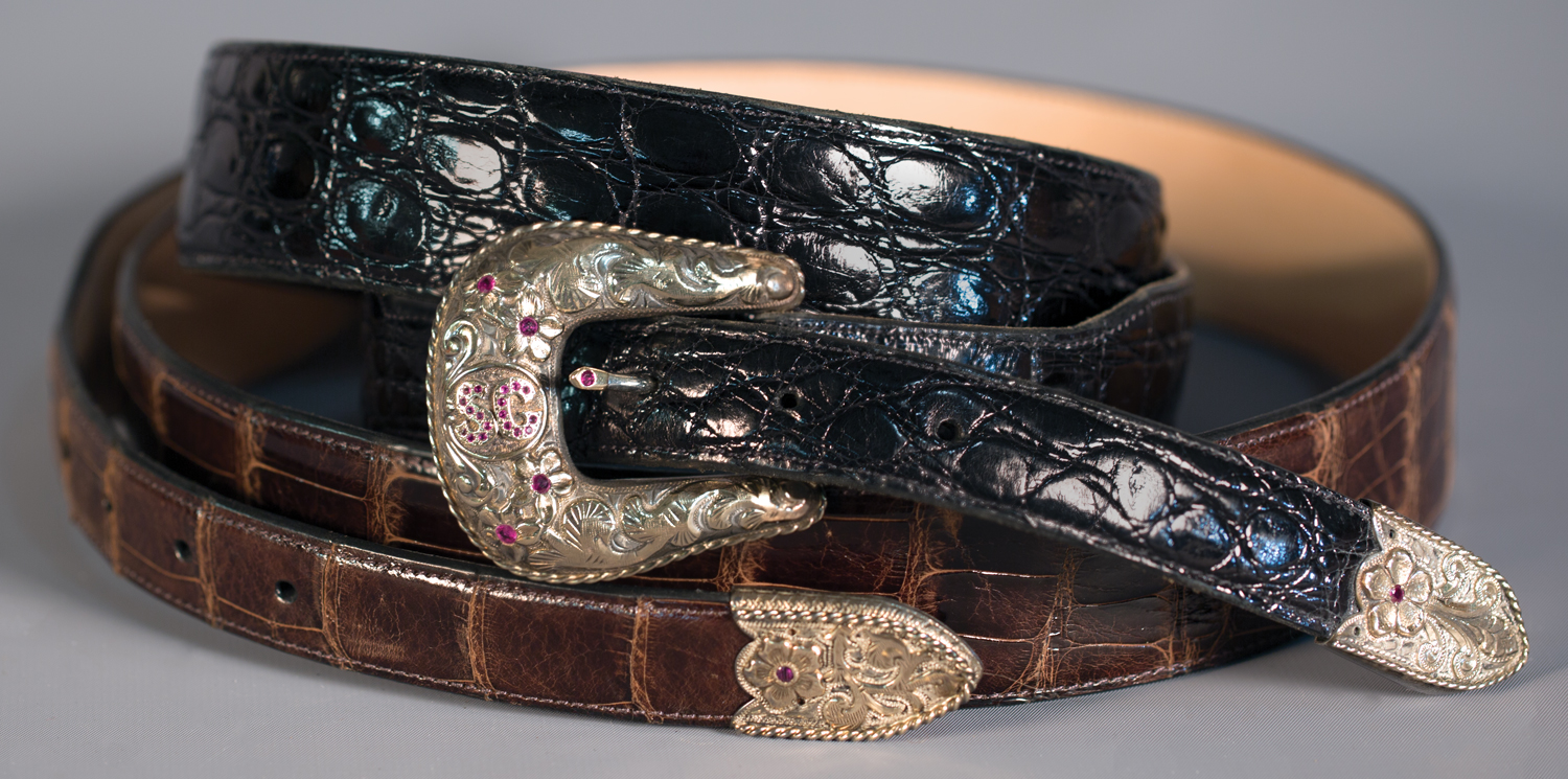 Lot 82: Edward H. Bohlin Fancy "SG" Buckle with Belt, Sold $2,920. Provenance: From the Estate of Snuff Garrett.