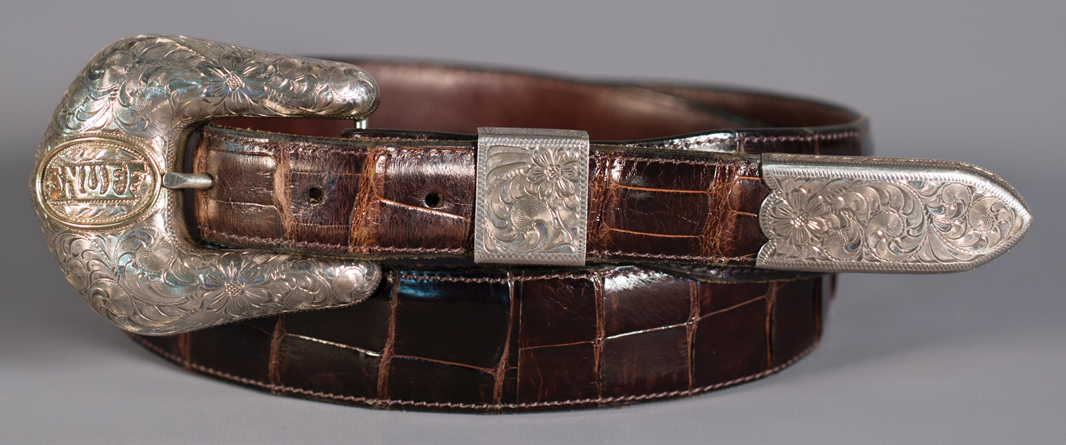 Lot 83: Bohlinmade, Hollywood "Snuff" Buckle on Alligator Belt, Sold $1,180. Provenance: From the Estate of Snuff Garrett.