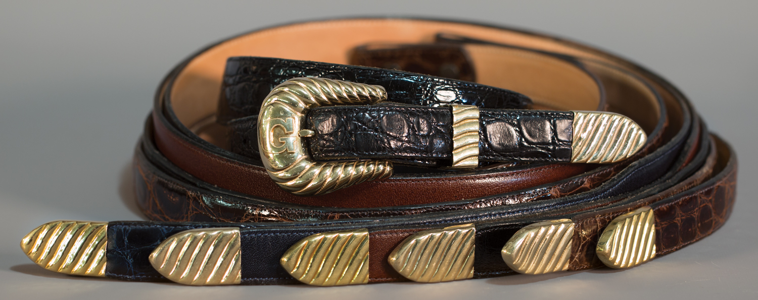 Lot 87: 14K & 18K Bohlin Buckle Set with Extras, Sold $3,835. Provenance: From the Estate of Snuff Garrett