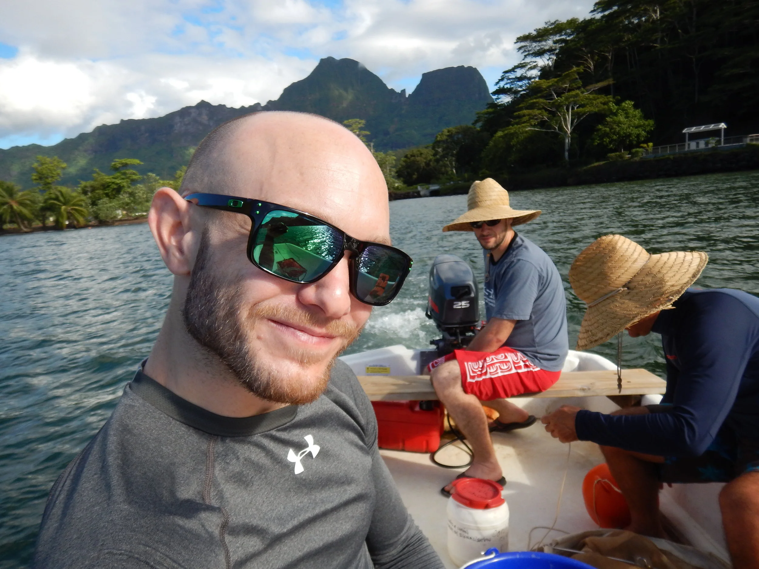 Tommy, Shaun, and Ricardo doing plankton tows to feed the young clownfish (photo Tommy Norin).