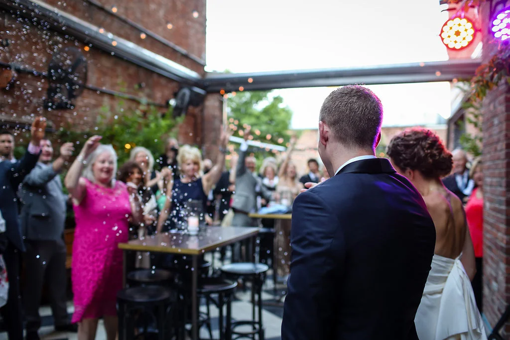Bisou couple Allison and Brett chose one of our personal favorites for the send off at the gorgeous Wythe Hotel in Brooklyn NY....confetti! Photo Credit: Clark+Walker Photography