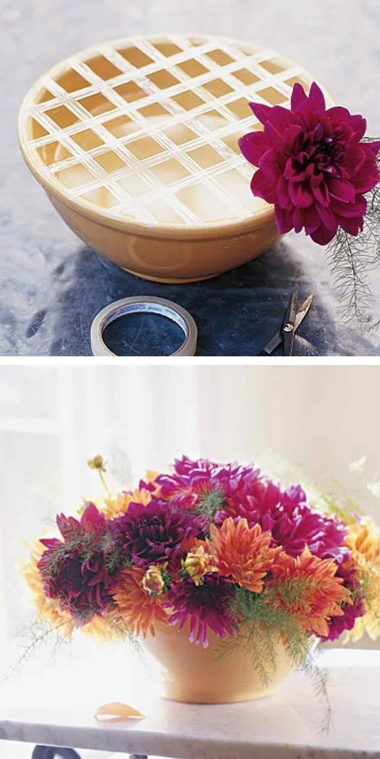 1.-Use-a-grid-of-tape-to-keep-your-flowers-in-place.-13-Clever-Flower-Arrangement-Tips-Tricks.jpg