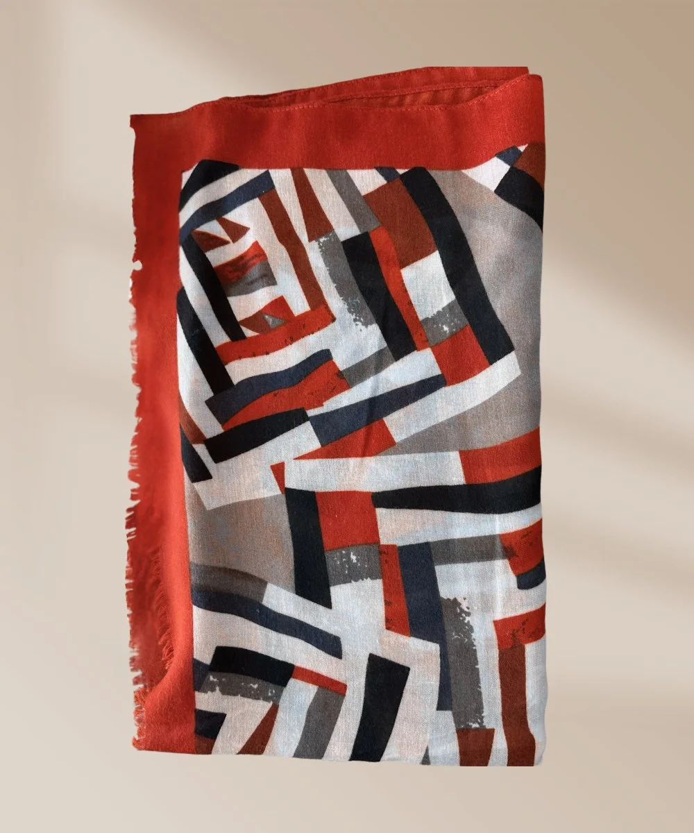 Our Seattle Skyline Project in downtown Seattle suited our client's lifestyle, but did not reflect her taste. Wanting a fresh perspective, she turned to our firm. Early on, she shared a beloved scarf that inspired our color scheme. We were easily abl