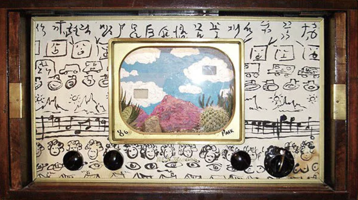  Nam June Paik (1932-2006)   Smiling Gate,  1986  Mixed media television artwork  Signed and dated on front of television  Provenance: Wanda Hansen Gallery, Saualito, CA; Santa Barbara collector  Dimensions: 22.5 × 25.5 × 14.5 in 