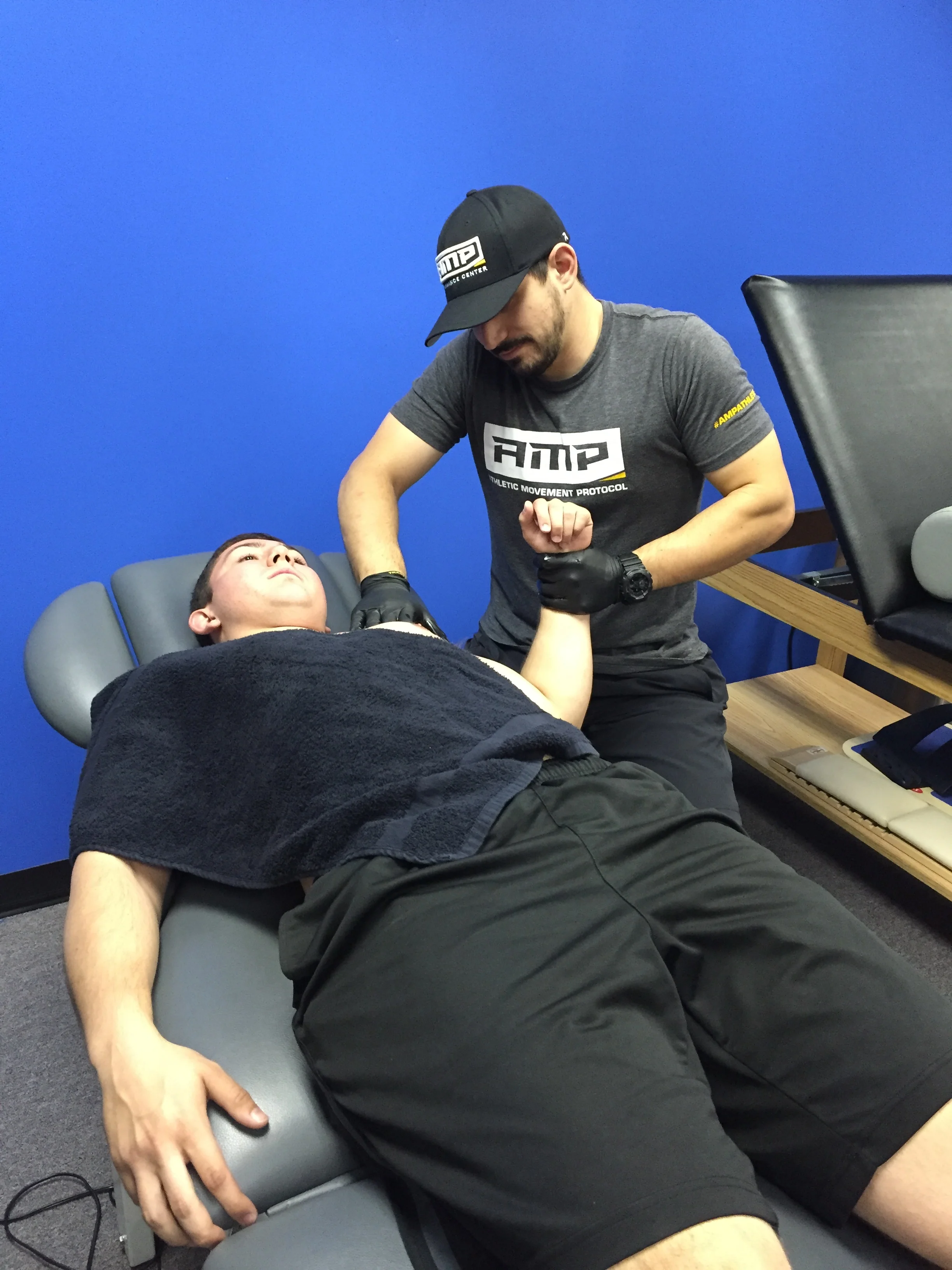 AMP Athlete Sal Pipia receives Manual Therapy on his shoulder to restore lost range of motion after surgical repair.