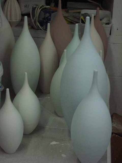 Glazed pots going into kiln for firing